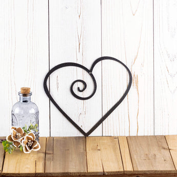 Heart metal wall decor, in silver vein powder coat. 