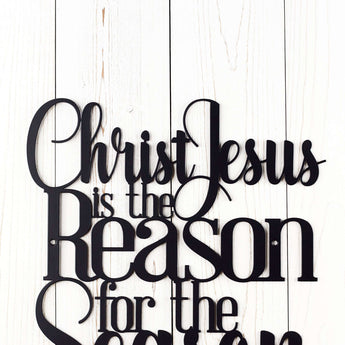 Close up of Christ is the Reason for the Season metal sign, in matte black powder coat.