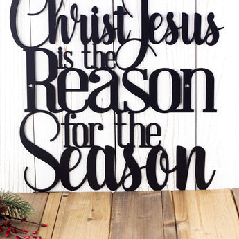 Close up of Christ is the Reason for the Season metal sign, in matte black powder coat.