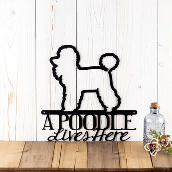 A Poodle Lives Here metal sign, with Poodle silhouette, in matte black powder coat.