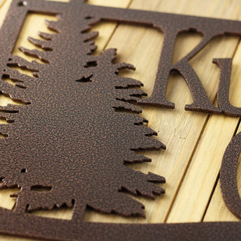 Close up of copper vein powder coat on our rectangular custom metal sign.