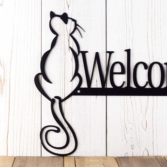Close up cat silhouette on our cat welcome metal wall art, in matte black powder coat. 