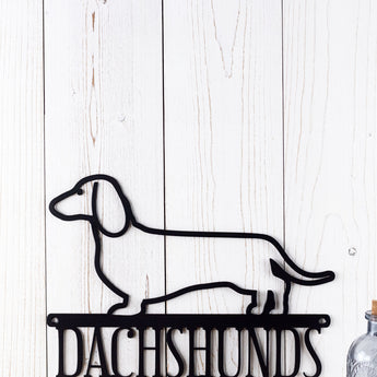 Close up of Dachshund dog silhouette on our Dachshund metal sign, in matte black powder coat.