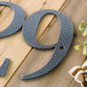 Close up of silver vein powder coat on our metal house number sign. 