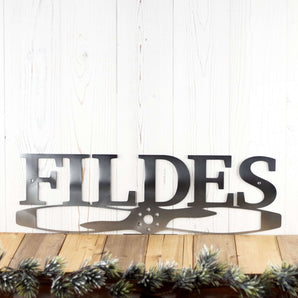 Aviator pilot family name metal sign with propeller, in raw steel. 
