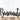 Close up of Benvenuto script welcome metal sign, in matte black powder coat.