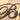 Close up of copper vein powder coat on our Blessings script metal wall art. 