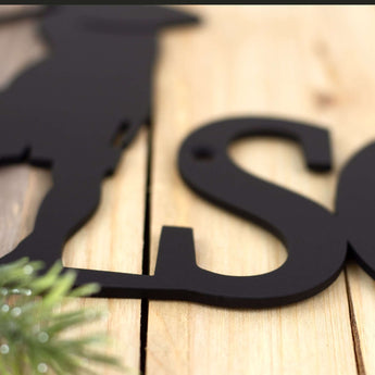 Close up of matte black powder coat on our personalized name sign. 