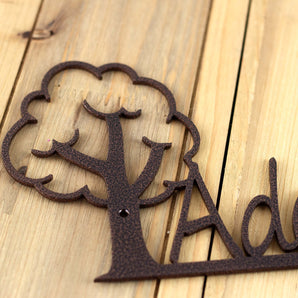 Close up of copper vein powder coat on our boy or girl metal name wall art.