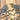 Close up of silver vein powder coat on our Live Laugh Love metal wall art with birds and heart.