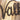 Close up of Välkommen script metal sign, in copper vein powder coat.