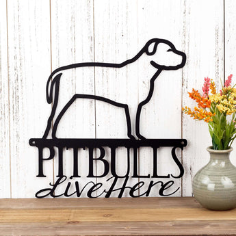 Pitbulls live here metal sign with natural ears, in matte black powder coat.