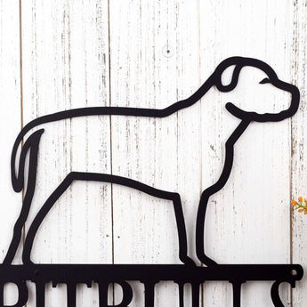 Close up of Pitbull dog breed silhouette, in matte black powder coat. 