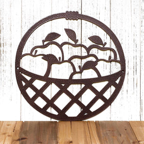 Metal round sign with a basket full of apples, in copper vein powder coat. 