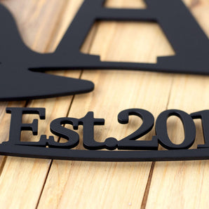 Close up of Established year on our aviation metal sign, in matte black powder coat. 
