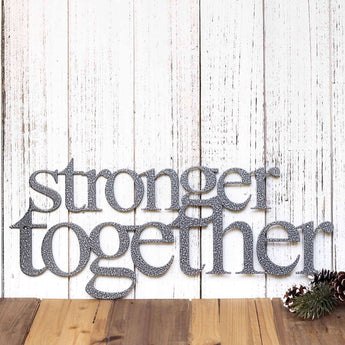 Stronger Together metal wall decor, in silver vein powder coat. 