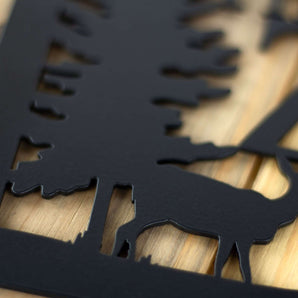 Close up of matte black powder coat, on our personalized name sign. 