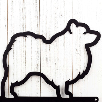 Close up of an Eskie silhouette on our Eskie metal sign, in matte black powder coat. 