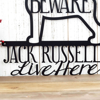 Close up of Jack Russells Live Here wording on our metal sign, in matte black powder coat.