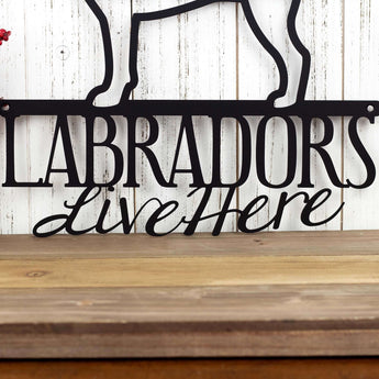 Close up of Labradors Live Here wording on our Labrador dog metal wall art.