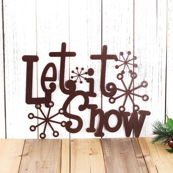Let it Snow metal wall decor with snowflakes, in copper vein powder coat. 