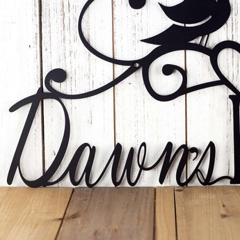Close up of first name on our personalized metal kitchen sign, in matte black powder coat. 