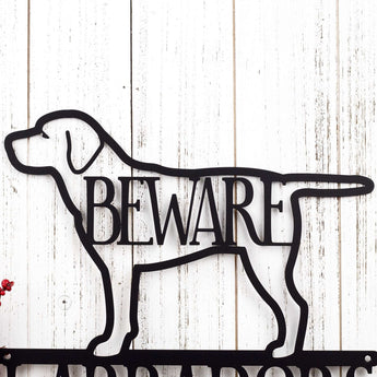 Close up of Labrador dog silhouette, with Beware, on our metal sign, in matte black powder coat.