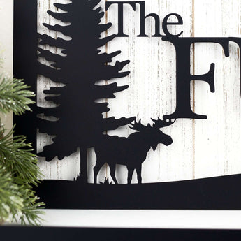 Close up of moose silhouette on our custom family name metal sign, in matte black powder coat. 
