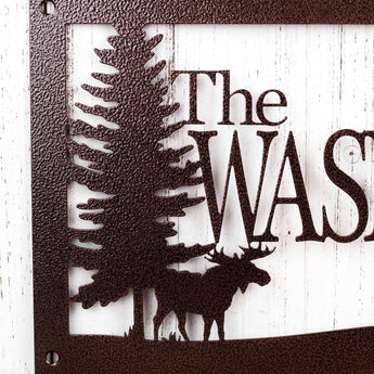 Close up of moose silhouette on our personalized family name metal sign, in copper vein powder coat.
