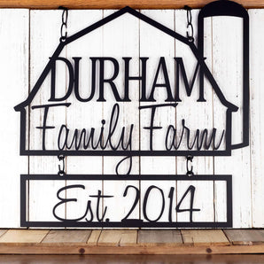 Custom farm metal sign with family name and established year, in matte black powder coat. 