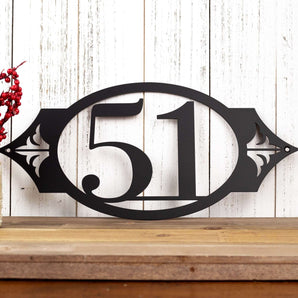2 digit oval metal house number sign with fleur de lis, in matte black powder coat. 