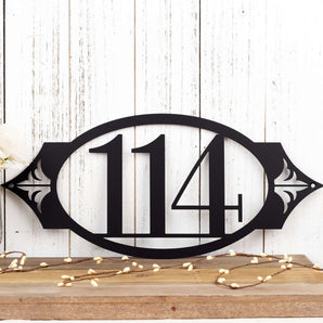 3 digit oval metal house number sign with fleur de lis, in matte black powder coat. 