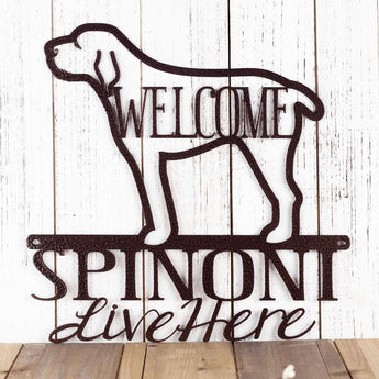 Spinoni Live Here metal plaque, with Welcome, in copper vein powder coat.