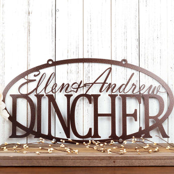 Oval family name metal sign with first names and last name, in copper vein powder coat. 