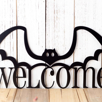 Halloween Bat Welcome metal sign, in matte black powder coat.