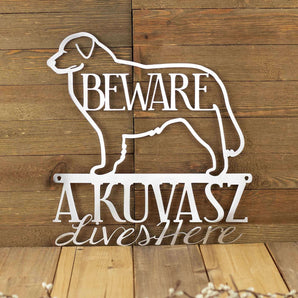A Kuvasz Lives Here metal sign, with Beware, in raw steel.