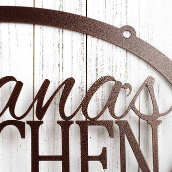Close up of name on our personalized kitchen sign, in copper vein powder coat. 