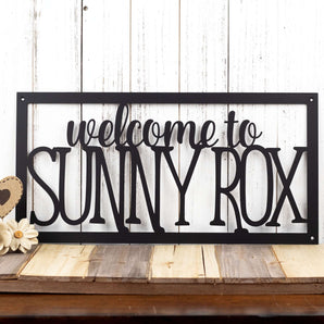 Rectangular Welcome to Home Name metal sign, in matte black powder coat.