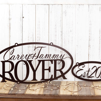 Oval sign with first names and family last name, along with an established year metal sign, in copper vein powder coat. 