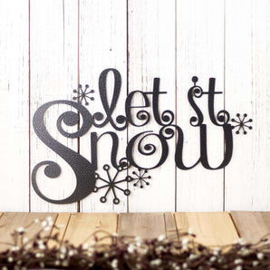 Let it Snow metal wall art with snowflakes, in silver vein powder coat. 