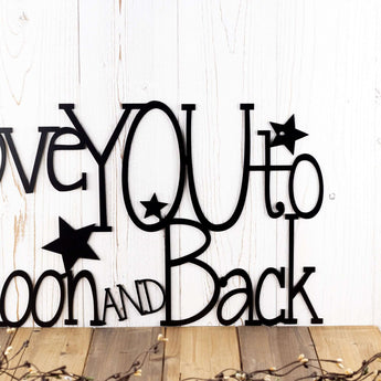 Close up of lettering on our Love You to the Moon and Back metal wall art, in matte black powder coat.