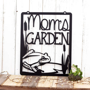 Mom's garden hanging metal sign with frog, lily pad, and cattails, in matte black powder coat.
