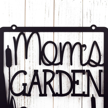 Close up of Mom's Garden wording on our metal hanging sign, in matte black powder coat.