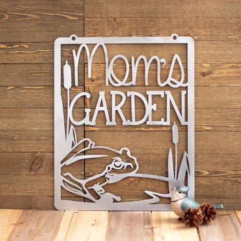 Mom's garden hanging metal sign with frog, lily pad, and cattails, in raw steel.