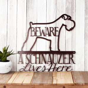 A Schnauzer Lives Here metal wall art, with Beware, in copper vein powder coat.