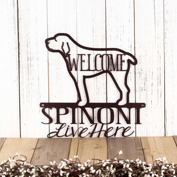 Spinoni Live Here metal wall art, with Welcome, in copper vein powder coat. 