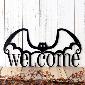 Cute welcome bat metal wall art, in matte black powder coat.