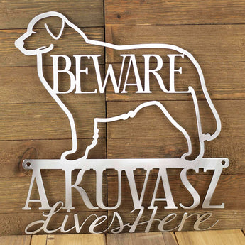 A Kuvasz Lives Here metal plaque, with Beware, in raw steel.