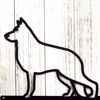 Close up of Belgian Shepherd metal wall art, in matte black powder coat.