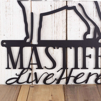 Close up of wording on our Bull Mastiffs Live Here metal sign, in matte black powder coat.